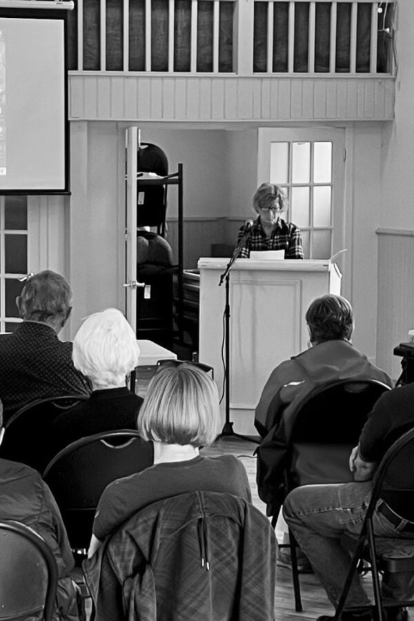 BVBTC Board Director speaks to the membership at the 2023 Annual General Meeting held at Kimberley Hall